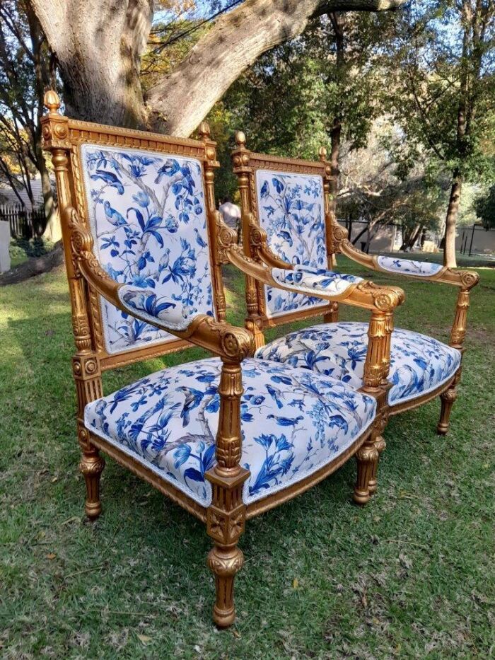 A Pair of French Style Ornately Carved Giltwood Arm Chairs - Image 11