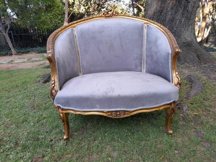 A Pair of French Ornately Carved and Gilded Bergere Chairs - Image 5