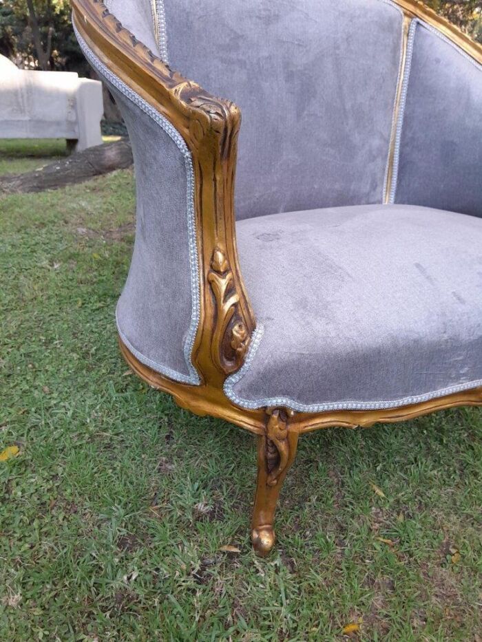 A Pair of French Ornately Carved and Gilded Bergere Chairs - Image 6