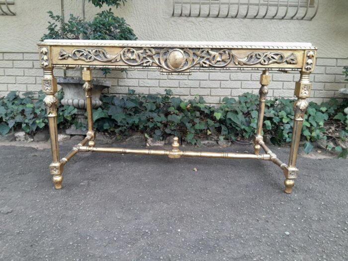 A 20th Century Ornately Carved and Hand-Gilded Console Table with Cream Marble Top - Image 2