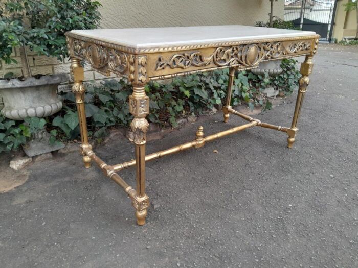 A 20th Century Ornately Carved and Hand-Gilded Console Table with Cream Marble Top - Image 6