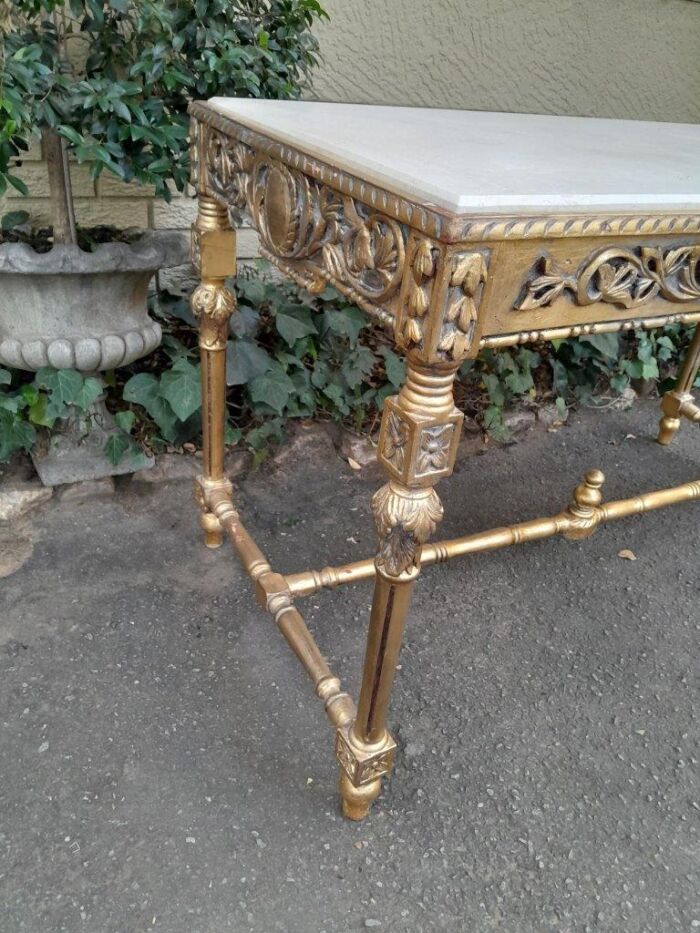 A 20th Century Ornately Carved and Hand-Gilded Console Table with Cream Marble Top - Image 7