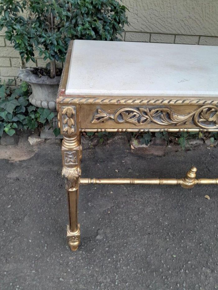 A 20th Century Ornately Carved and Hand-Gilded Console Table with Cream Marble Top - Image 8