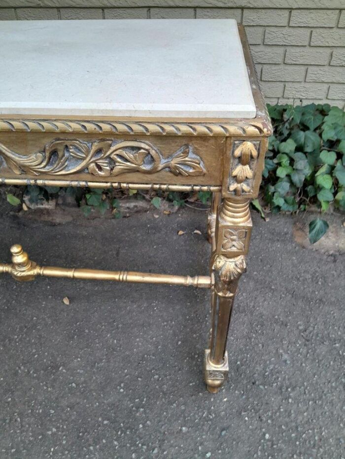 A 20th Century Ornately Carved and Hand-Gilded Console Table with Cream Marble Top - Image 9