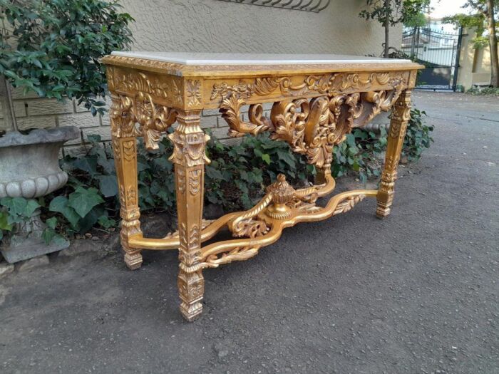 A 20th Century Ornately Carved and Hand-Gilded Console Table with Cream Marble Top - Image 4