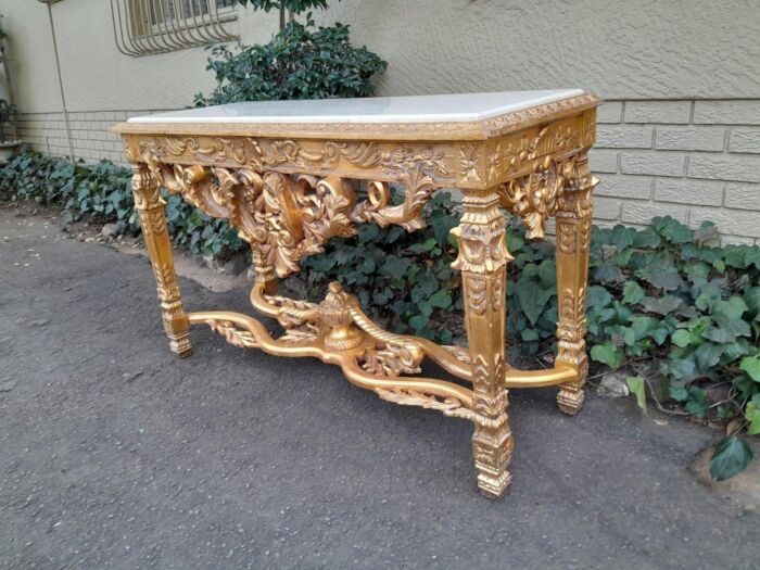 A 20th Century Ornately Carved and Hand-Gilded Console Table with Cream Marble Top - Image 5