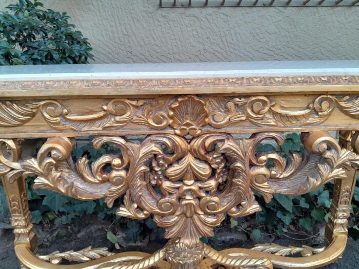 A 20th Century Ornately Carved and Hand-Gilded Console Table with Cream Marble Top - Image 9