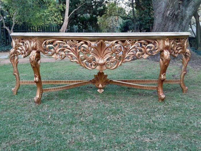 A 20th Century Ornately Carved and Hand-Gilded Console Table of Large Proportion with Cream Marble Top - Image 2