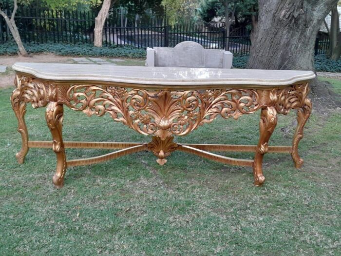 A 20th Century Ornately Carved and Hand-Gilded Console Table of Large Proportion with Cream Marble Top - Image 3