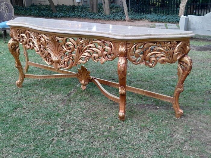 A 20th Century Ornately Carved and Hand-Gilded Console Table of Large Proportion with Cream Marble Top - Image 5