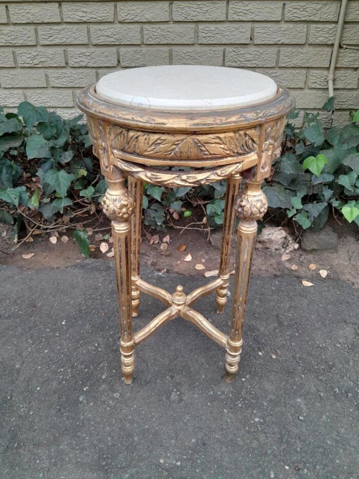 A 20th Century French Style Carved And Hand Gilded Side Table With Marble Top