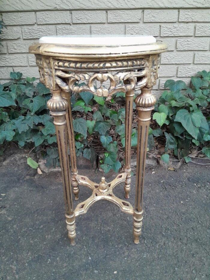 A 20th Century French Style Carved and Hand Gilded Side Table with Marble Top