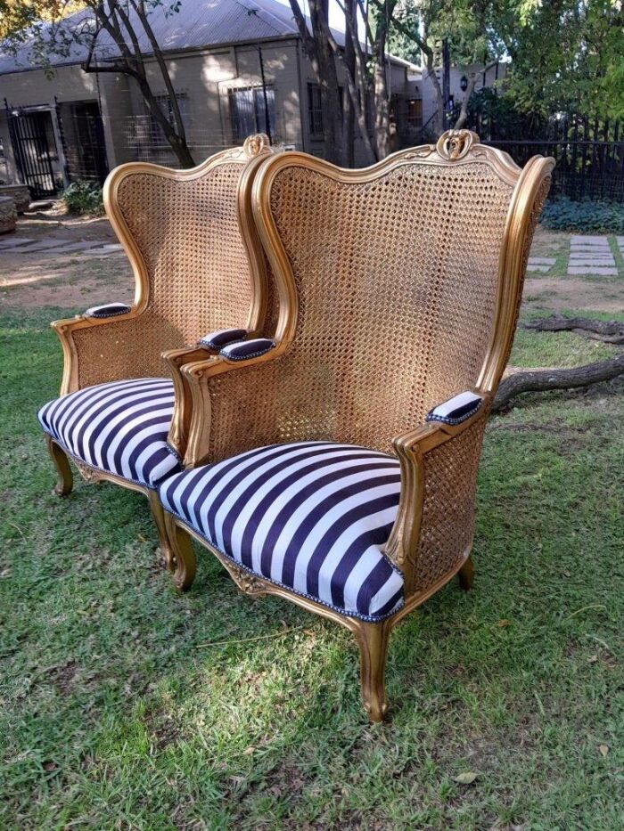 A Pair of 20th Century French Style Gilt Wood Arm Chairs with Rattan Back - Image 3