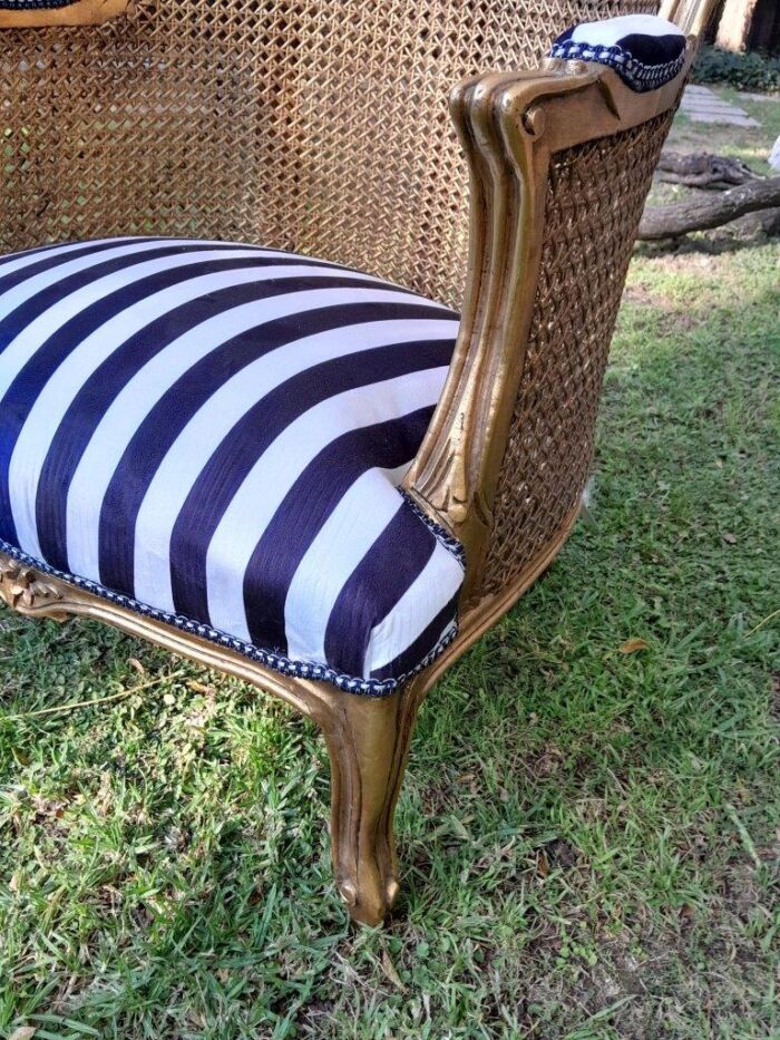 A Pair of 20th Century French Style Gilt Wood Arm Chairs with Rattan Back - Image 7