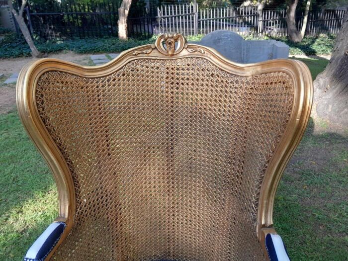 A Pair of 20th Century French Style Gilt Wood Arm Chairs with Rattan Back - Image 8