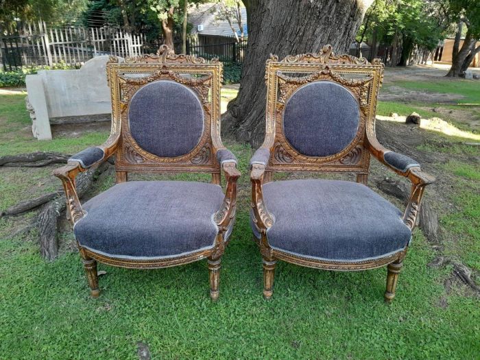 A Pair Of 20th Century French Style Ornately Carved Gilt Wood Arm Chairs - Image 2