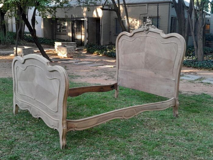 A 20TH Century French Walnut Rococo Style Double Bed in a Contemporary Bleached Finish