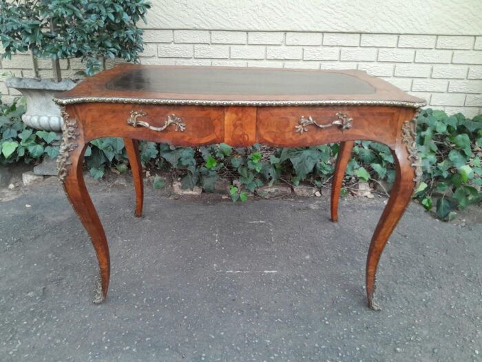 A 19th Century Circa 1895 Rare And Original French Walnut Plat Desk With Two Drawers And Gilt Metal Mounts And Original Tooled Leather Top