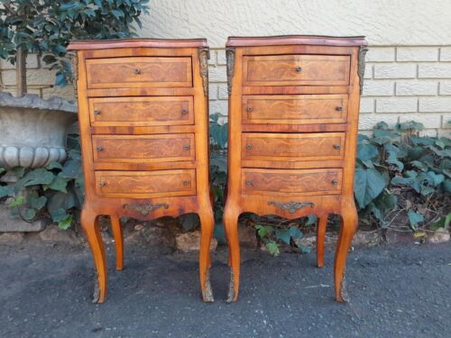 A 20th Century Circa 1920 Pair of French Walnut and Inlaid Bowfront Pedestals with Gilt Metal Mounts and Four Drawers