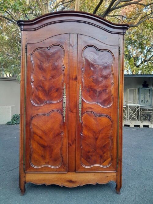 An Early 19th Century French Walnut and Cherrywood Port Armoire with Original Brass Fittings