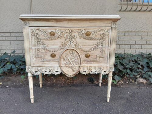 A 20th Century French Louis XV Style Ornately Carved Two Drawer Chest of Drawers in a Cotemporary Bleached Finish