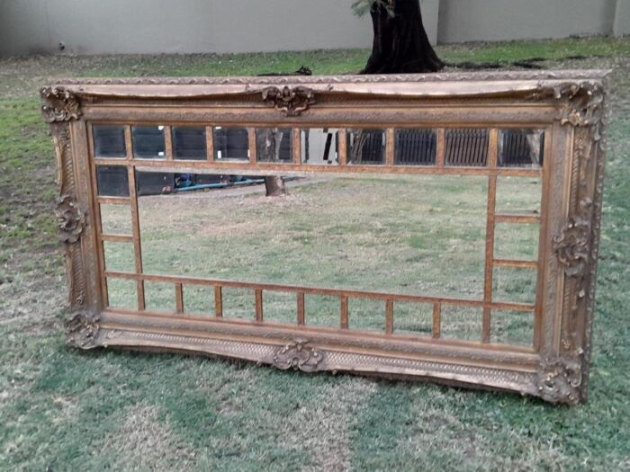 Gilt Painted And Bevelled Mirror Of Large Proportions