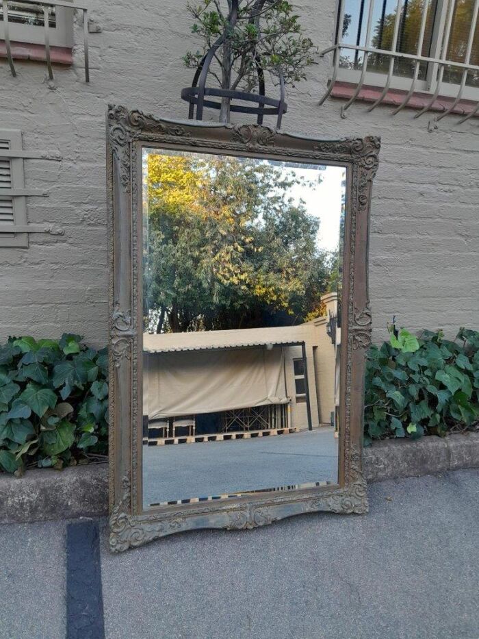 A 20th Century Large And Ornately Carved Gilded And Bevelled Mirror - Image 4