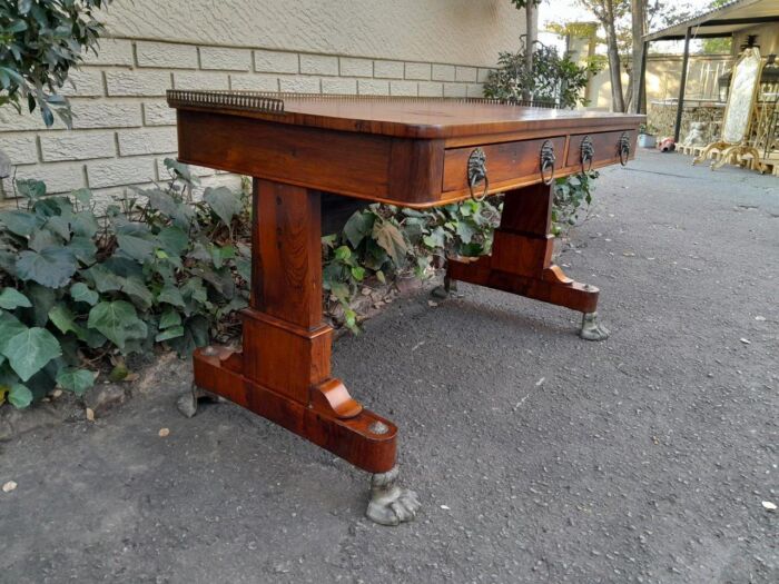 A 19th Century William IV Rosewood Desk with Gilt Tooled Leather and Gilt Metal Gallery Top on Bronze Lion Claw Feet - Image 6