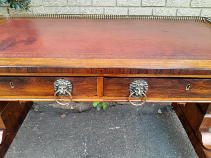 A 19th Century William IV Rosewood Desk with Gilt Tooled Leather and Gilt Metal Gallery Top on Bronze Lion Claw Feet - Image 13