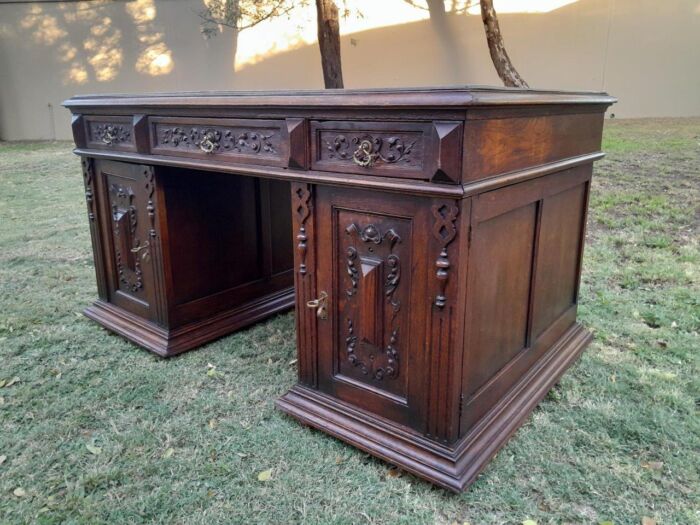 A 20th Century Ornately Carved Oak Pedestal Desk with Drawers - Image 5