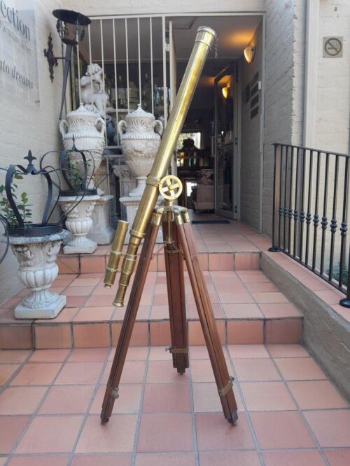 A 20TH Century Brass Nautical Telescope on Wooden Tripod