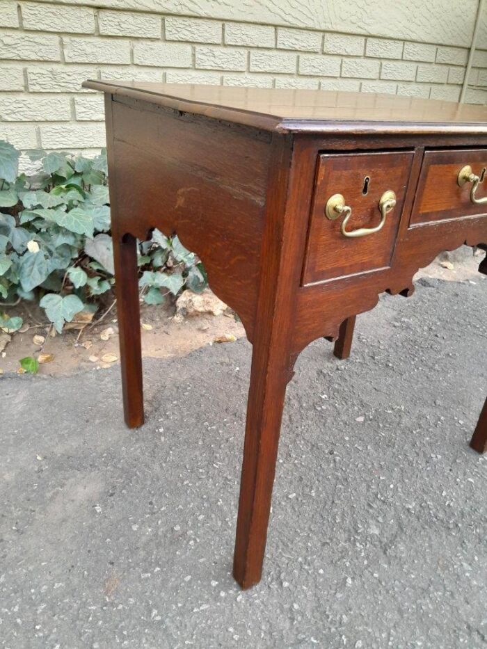 An 18th/ 19th Century Georgian Oak and Mahogany Lowboy with Drawers and Brass Handles - Image 6