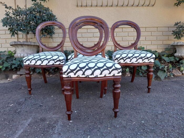 A 19th / 20th Century Victorian Set Of Four Mahogany Balloon Back Chairs