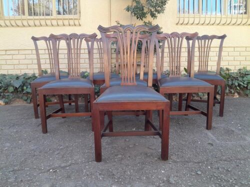 A 20th Century Set Of  Eight Carved Mahogany George Lll Style Dining Chairs Upholstered In Leather