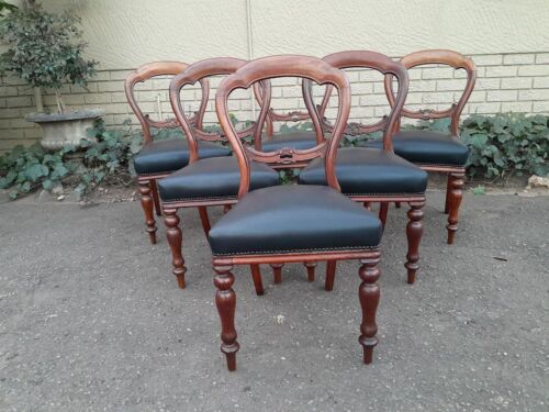 An Antique Set Of Six Victorian Carved Walnut Dining Chairs Upholstered In Leather