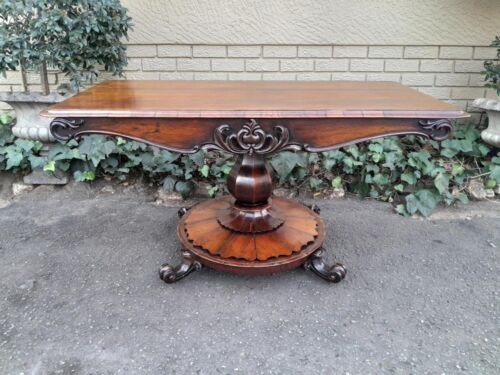 An Antique Victorian Rosewood Sofa Table on Castors