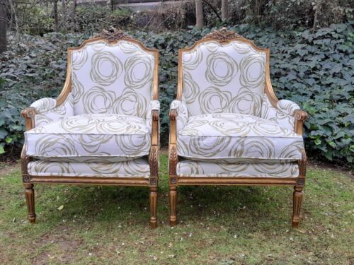 A 20th Century French Style Giltwood Armchairs