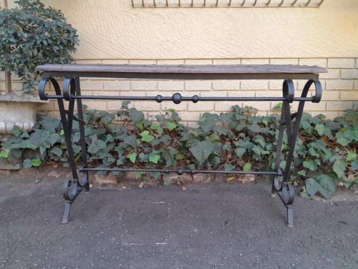 A 20th Century Wrought Iron and Hardwood Top Console Table