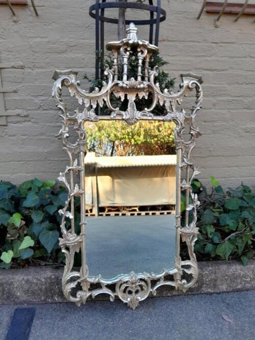 A 20th Century Ornately Carved Silver Mirror