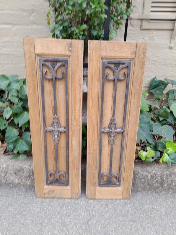 A 20th Century Pair of French Decorative Bevelled Wooden Wall Panels with Wrought Iron Design Elements In a Contemporary Bleached Finish (For Either Side of a Mirror) - Image 2