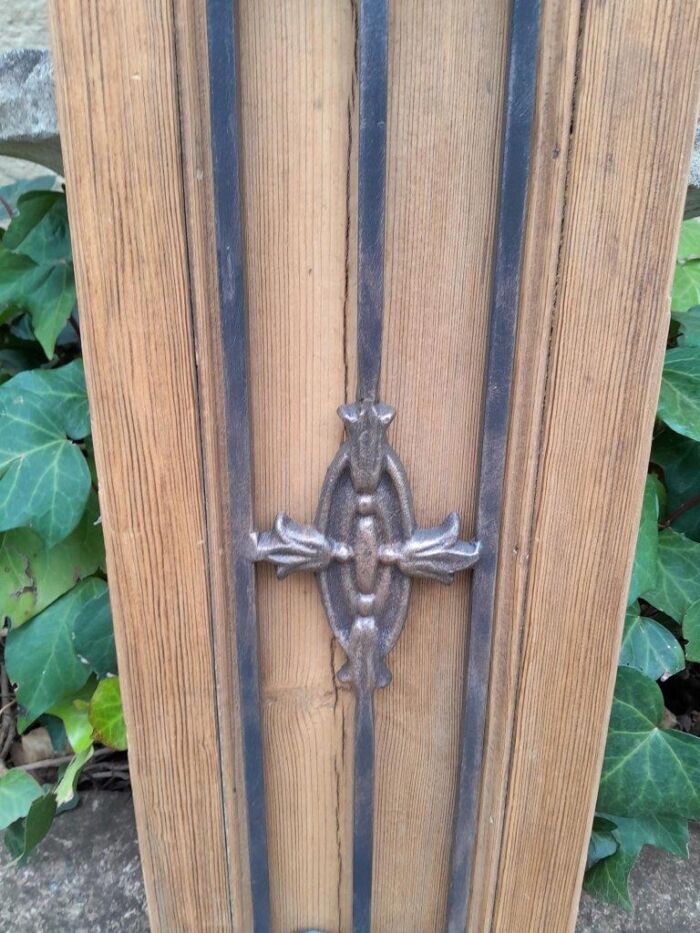 A 20th Century Pair of French Decorative Bevelled Wooden Wall Panels with Wrought Iron Design Elements In a Contemporary Bleached Finish (For Either Side of a Mirror) - Image 6