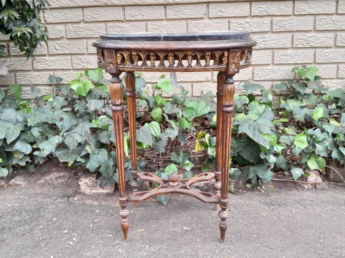 An Antique French Giltwood Table with Marble Top