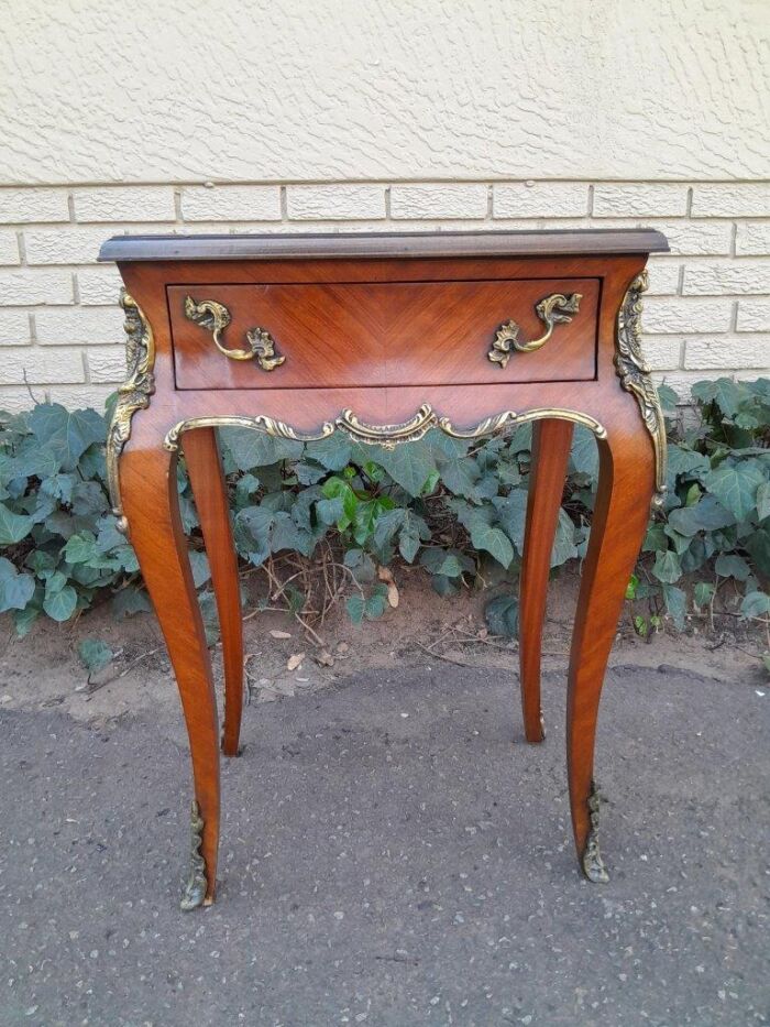 A 20th Century French Kingswood Table With Gilt Metal Mounts