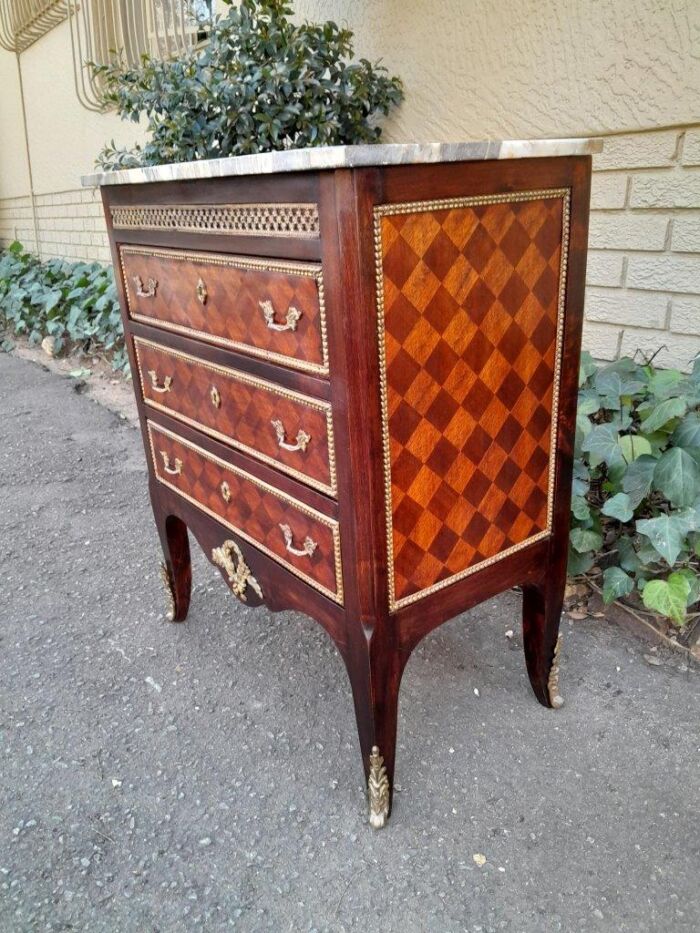 A 20th Century Parquetry Chest Of Drawers With Gilt Mounts And Marble Top - Image 4