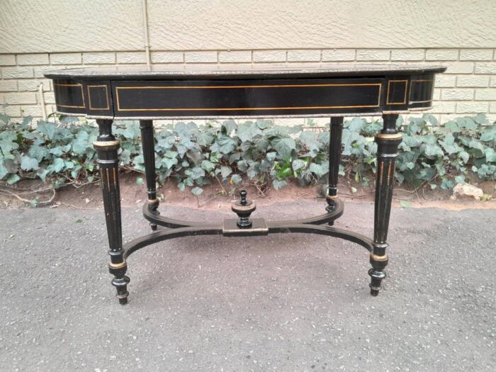 An Antique Victorian Ebonised and with Brass and Mother of Pearl Inlay Table with Drawer