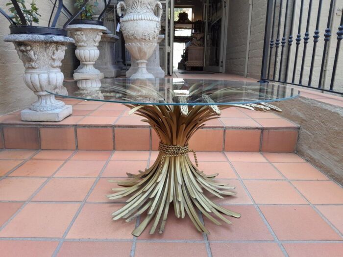 A 20th Century Rare Sculptured Iron Table Base in an Antique Gold Finish with Bevelled Glass Top (This table appears in Coco Chanels Paris Apartment)