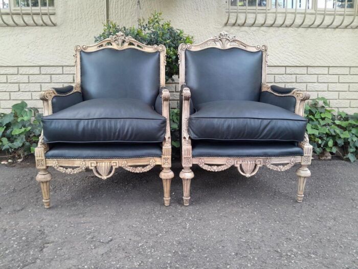 A 20TH Century Pair of Walnut French Louis XVI-style Fauteuils / Armchairs