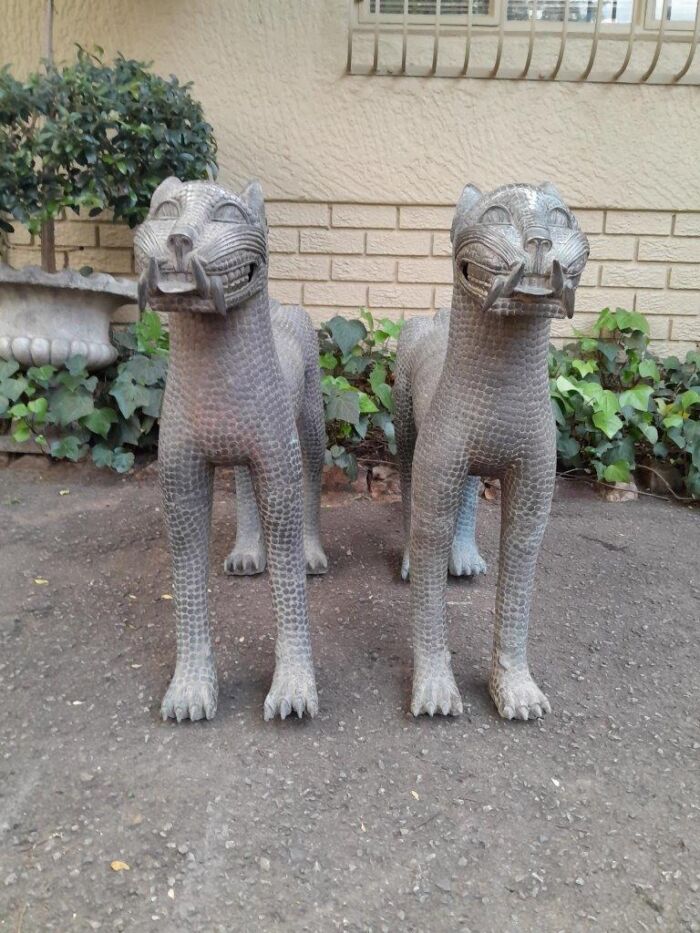 A Mid-20th Century Pair Of Benin Bronze Leopard Statues