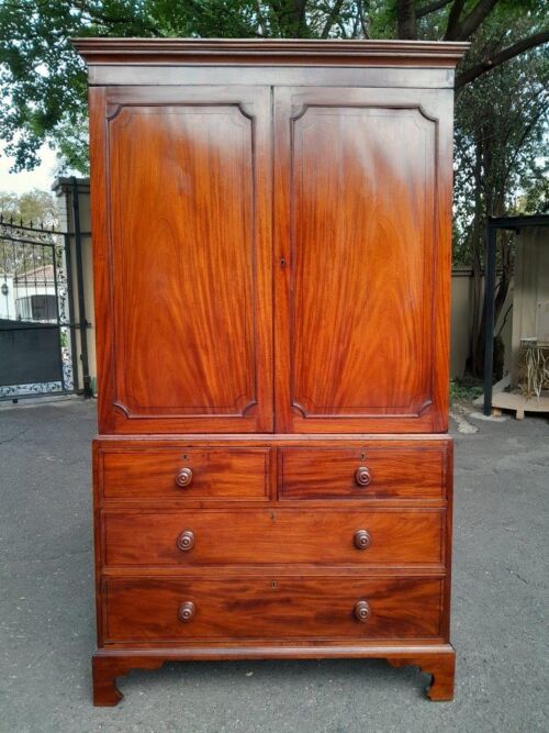 An Early 800s George III Linen Press Cupboard with Patina