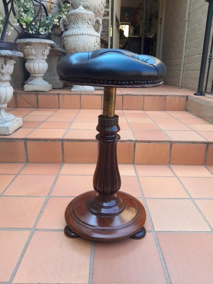 An Antique Victorian Mahogany Piano Stool With Deep  Button Leather Upholstery